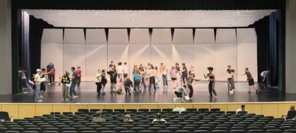 Hillcrest students rehearse the final battle of the play.